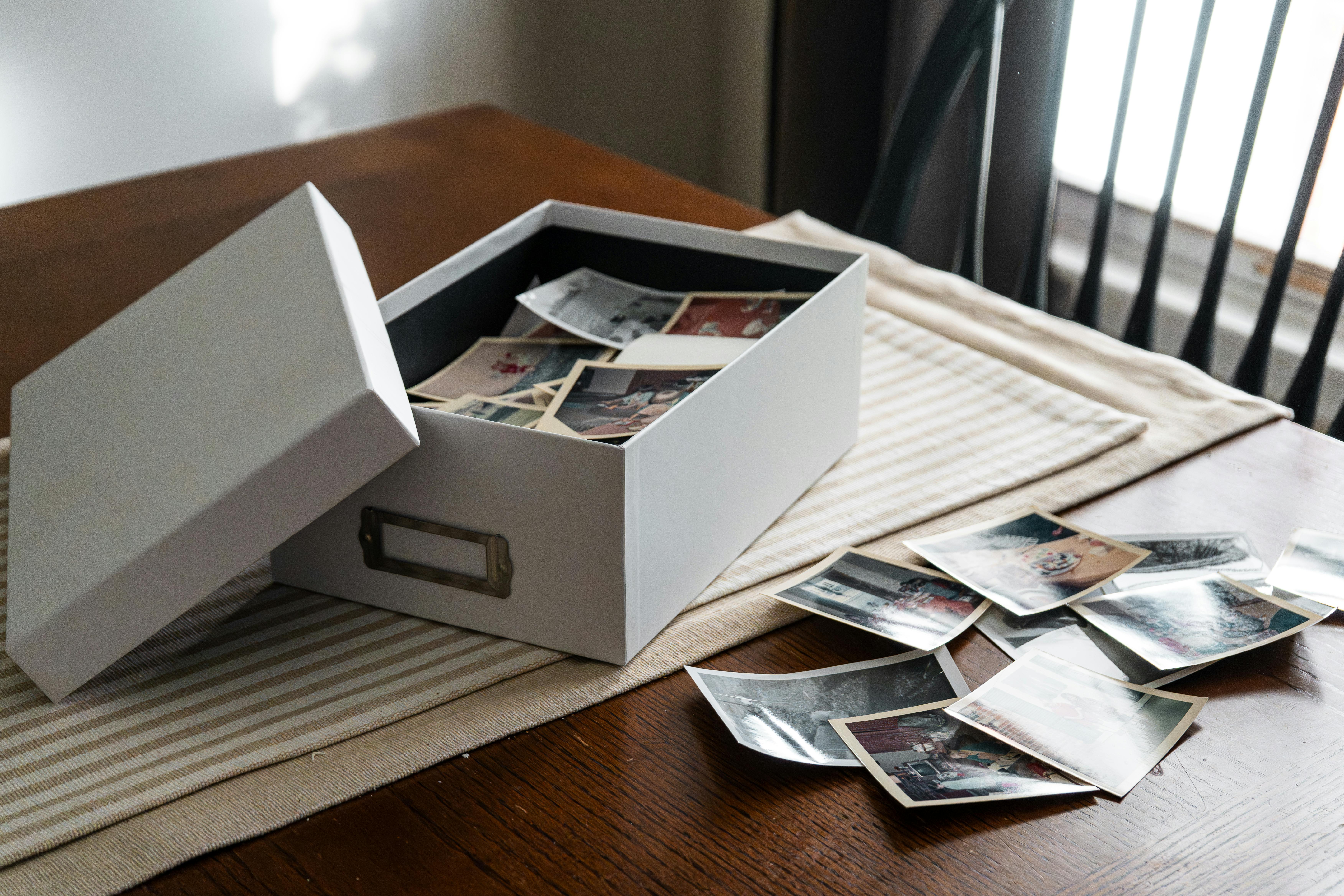 Old family photographs being carefully preserved for future generations
